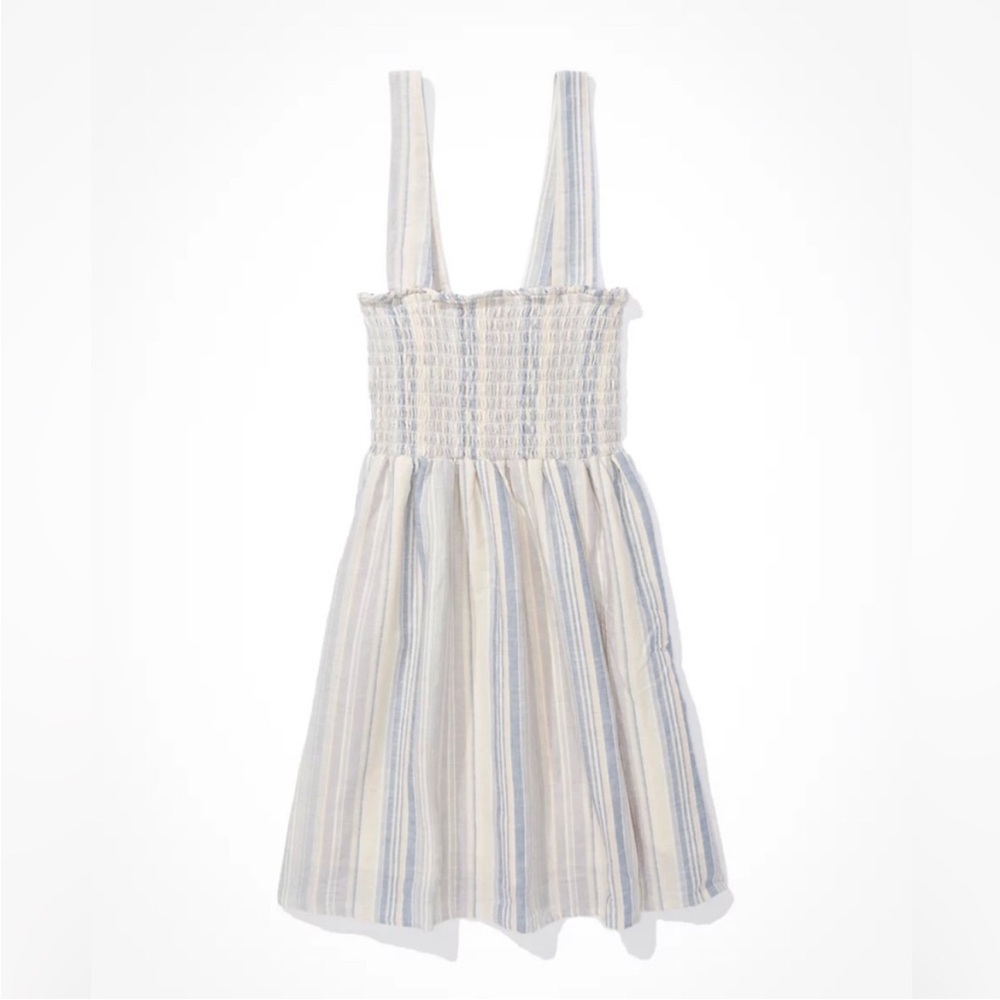 American Eagle outfitters smocked mini dress with a crisscross back. Size small.